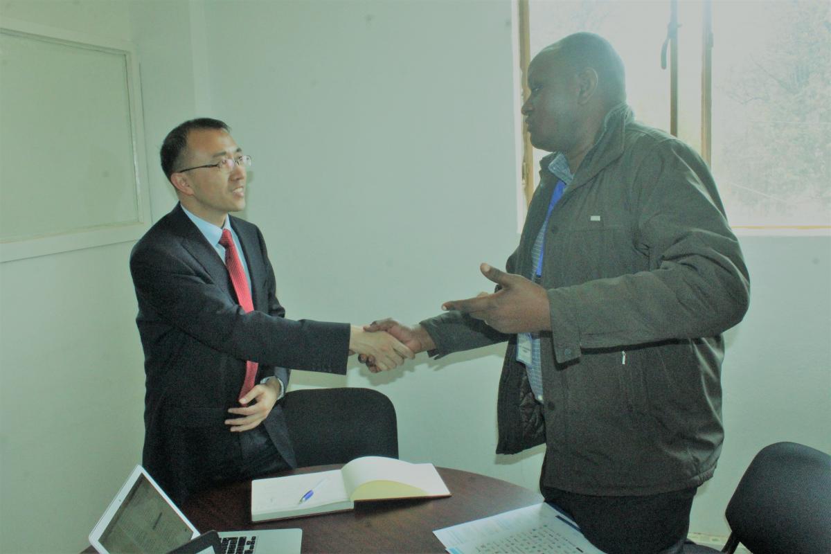 Dr Jianming WANG and Dr Prof. Dr-Ing. Etienne Ntagwirumugara 